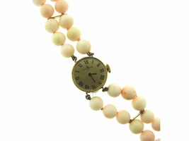 Baume & Mercier 14K Yellow Gold & Angel Skin Coral Circa 1950s Baume & Mercier